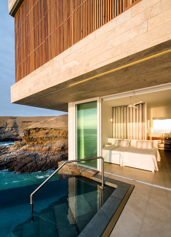 El dormitorio principal apuesta por una atmósfera serena y funcional.