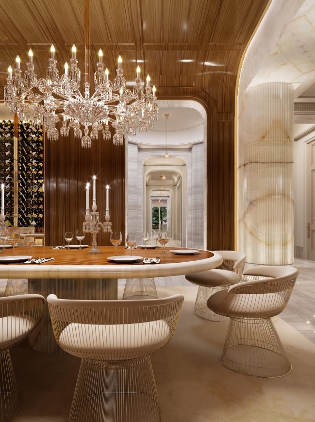 El área de comedor combina lujo y funcionalidad, con una mesa central de gran formato pensada para reuniones privadas en un ambiente cuidadosamente diseñado.